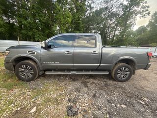 2023 Nissan TITAN XD Crew Cab Platinum Reserve 4x4 - Exterior Side Driver Image